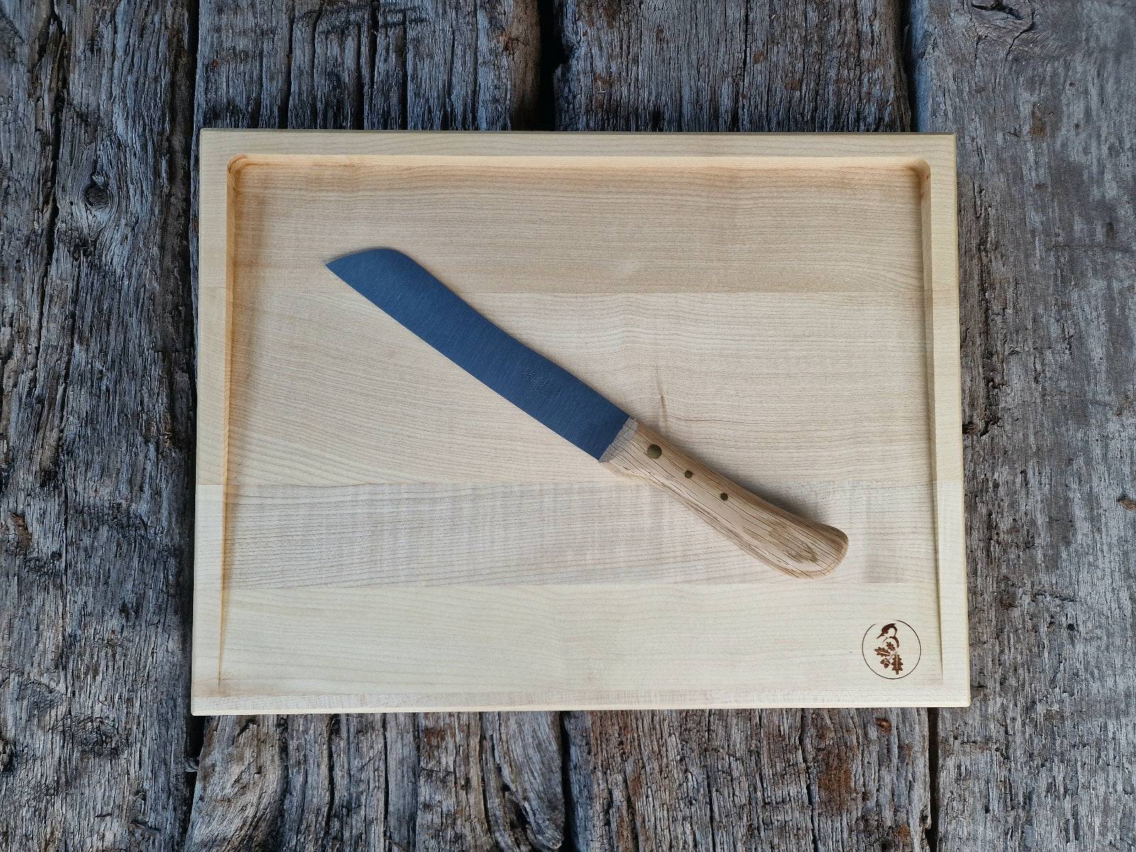 Tranchierbrett aus massivem Ahorn mit einem Windmühlenmesser Hamburger mit Eiche-Griff.