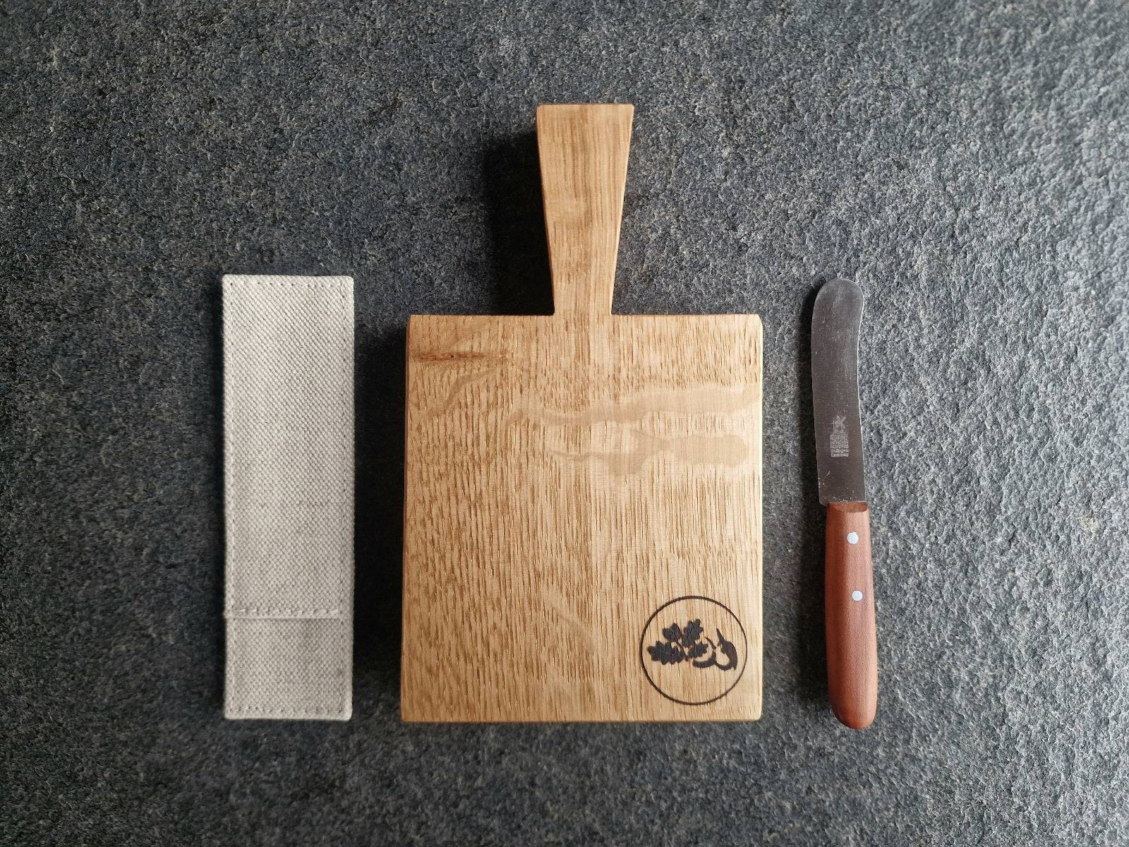 3-teiliges Butterboard Set bestehend aus einem Etui, Holzbrett und Windmühlenmesser Buckels mit Pflaume Griff.