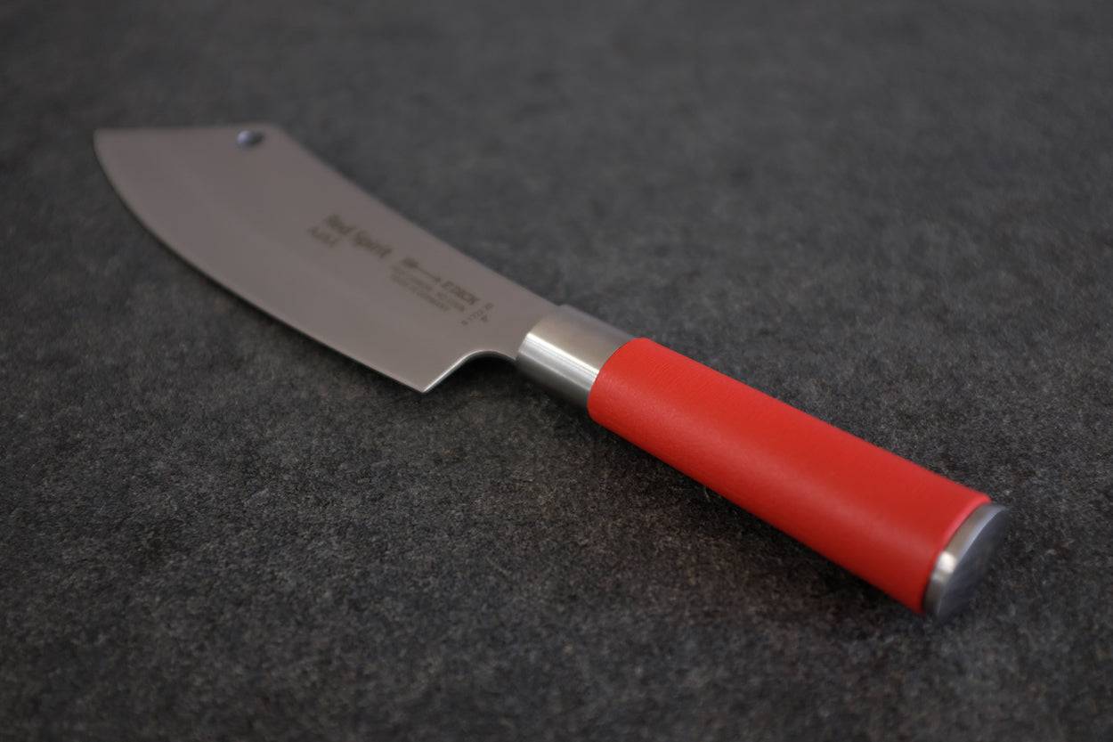 Kochmesser Ajax von Dick mit rotem Griff auf einer Steinplatte
