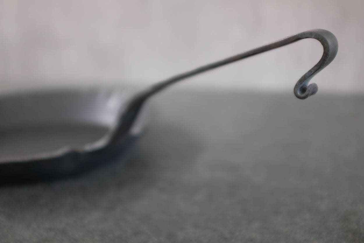 Hakenstiel von Eisenpfanne.